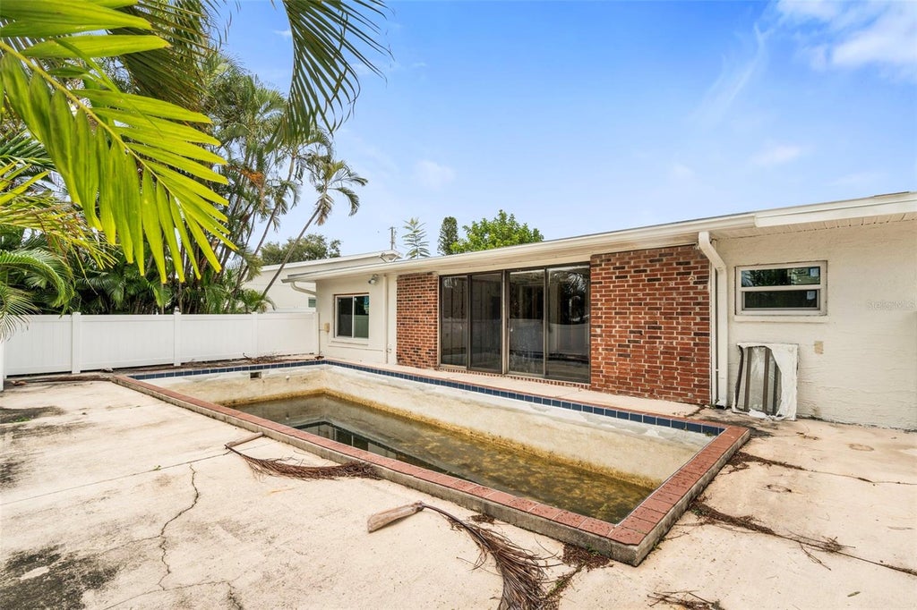 Photo of 9570 Sun Isle Drive NE, St Petersburg, FL 33702 (MLS # TB8457108)