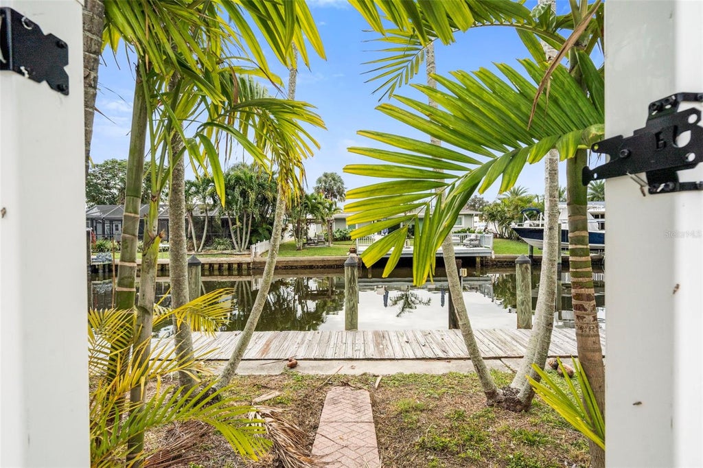 Photo of 9570 Sun Isle Drive NE, St Petersburg, FL 33702 (MLS # TB8457108)