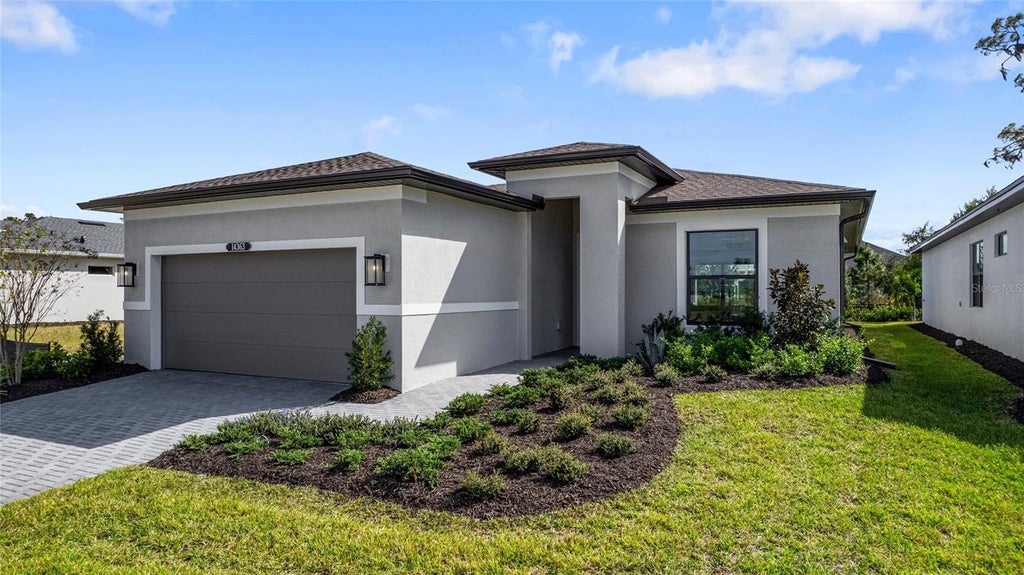 Photo of 14363 Hammock Oak Street, Parrish, FL 34219 (MLS # W7889939)