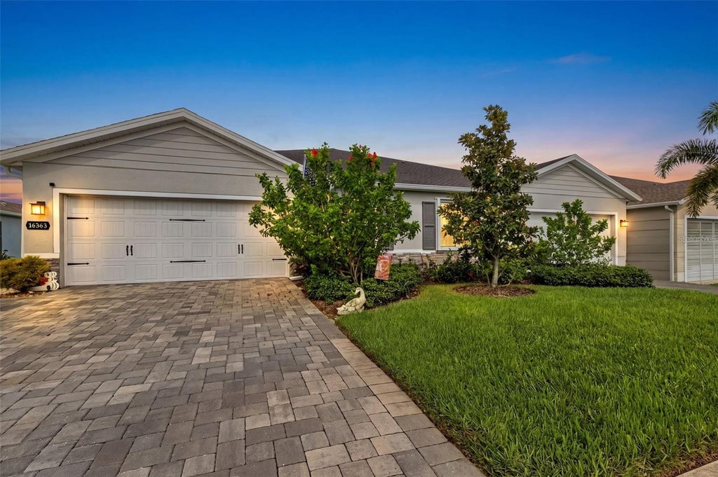 Photo of 16363 Coconut Palm Drive, Port Charlotte, FL 33953 (MLS # C7530568)