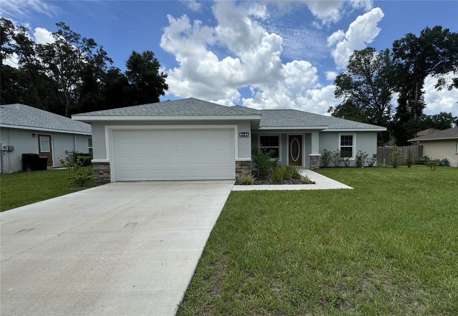 NICE HOME Located in the family-friendly and very quiet neighborhood of Orange Blossom Hills this 3BR/2BA home is within minutes of The Villages, Ocala, shopping, dining, schools, and much more. Situated on an OVERSIZED .22 acre lot security system, an irrigation system, 2-car garage, INSIDE utility room, and covered back patio. The kitchen features cabinetry with soft-close hardware and stunning granite countertops. The spacious master suite features a tray ceiling, a walk-in closet, and the master en-suite with his/her sinks, granite countertop, shaker cabinetry, and a seamless glass-enclosed walk-in shower. The spare bedrooms are spacious with a shared hall/guest bath and linen closet. From the curb appeal to the backyard, you'll fall in love with everything this home offers as the owner spared no expense. So don't wait and schedule your private tour today before it's gone! The Home Has A Year Builder Warranty.
*Looking to build your credit while renting? Look no further we provide credit reporting for all leases. Give us a call or see our website for more details
*1 Small Pet Permitted with Refundable Deposit *Breed Restrictions Apply
*Vaulted ceilings
*Stainless Steel Appliances
*Open floor plan that features a BONUS Florida room
*Tile/Carpet flooring
*Washer and Dryer hook up
*Private Well for water
*NO HOA
*Basic Lawn care and Pest Control included
***Tenant to be responsible for Weeding, Shrubs
*Tenant to be responsible for Weeding, Shrubs
*Seeking high-quality, long-term resident.