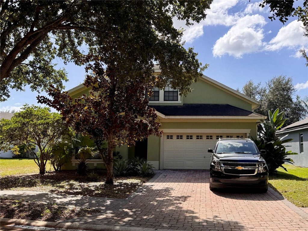 Photo of 713 Bridgeford Crossing Boulevard, Davenport, FL 33837 (MLS # S5160226)