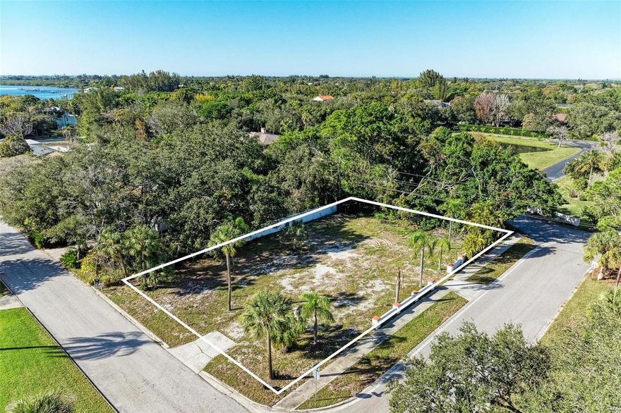 5 MINUTES TO ANNA MARIA ISLAND! Vacant lot ready to build. Low if no impact fees could be a savings of $25,000 to $30,000. 1/ 3 of an acre and will accommodate a home of up to 5,000 square feet with a pool in a very established neighborhood of homes $2,500,000+. No HOA!!! Bring your boat home and park it on the side of your home or in the driveway. Great short time rental opportunities. Your dream home will be 5 minutes from Anna Maria Island but NOT in a high hazard zone so affordable insurance premiums. NO GRAND OAKS to worry about and the lot is cleared, flat and ready for building. The listing agent is also a builder and will work with you to design exactly the home you will love and provide a budget and timeline for your custom dream home.