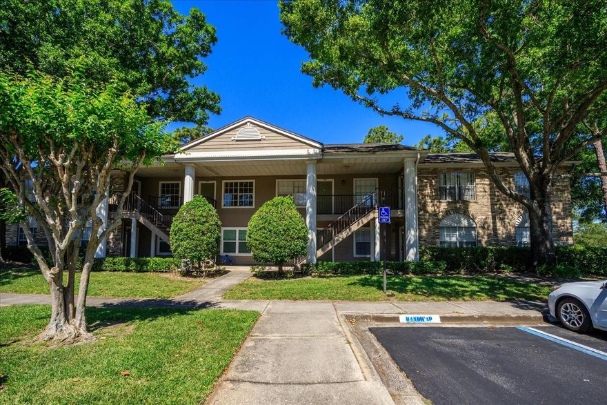 Beautiful first-floor unit in Hunters Reserve, just minutes from UCF and within walking distance to the UCF campus bus system, grocery stores, and restaurants. An ideal opportunity for scholars, parents, or investors seeking a prime location near campus. This updated condo features a brand new kitchen with white shaker cabinets and quartz countertops, 2025 AC, newly installed wood-look porcelain tile, and fresh interior paint throughout. Enjoy peaceful views of mature trees and the tennis courts from the enclosed patio. The community offers plenty of guest parking, plus one assigned parking space. Hunters Reserve amenities include a pool, clubhouse, weight room, tennis courts, and basketball court. HOA includes water and exterior building insurance.