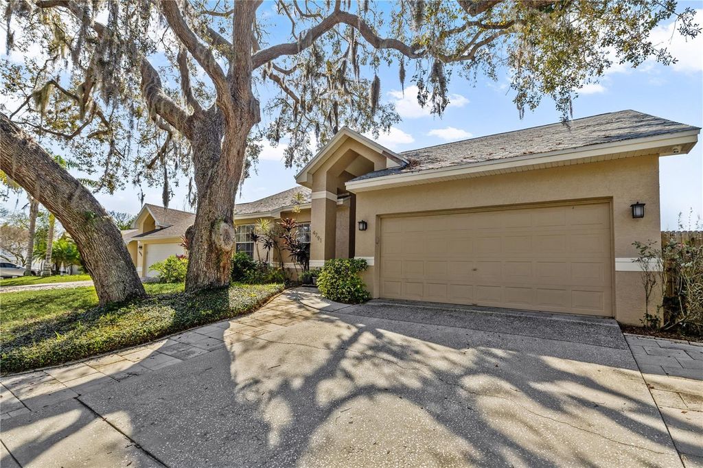 Photo of 4791 Klosterman Oaks Boulevard, Palm Harbor, FL 34683 (MLS # TB8485464)