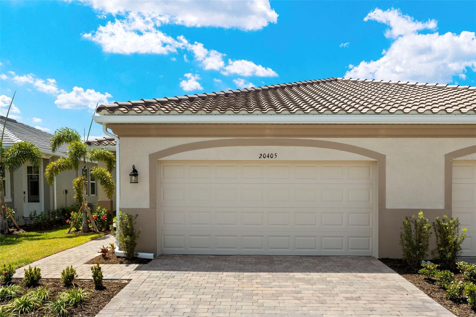 READY TO MOVE IN NOW! The stunning Largo paired villa is waiting for you to move in and enjoy the beautiful Florida weather today. Featuring a charming Spanish elevation, this home is perfect for both seasonal and year-round living. Offering 1,431 sq. ft. of stylish, open living space, this villa includes 2 bedrooms, 2 bathrooms, a 2-car garage, a laundry room, a study, and a covered lanai—ideal for relaxation and entertaining. The heart of this home is the bright and open kitchen, which boasts a large center island that comfortably seats 3, as well as gorgeous Carrara Breve quartz countertops, stainless steel appliances, and a spacious pantry. The kitchen flows seamlessly into the dining area, which comfortably seats 6 or more. The open living and dining space overlooks the private lanai and backyard, providing a peaceful retreat for both relaxing and entertaining. The generous owner's suite features a large walk-in closet and a private en-suite bath with dual sinks, a raised vanity, and a separate water closet. The secondary bedroom and bathroom are located at the front of the home, offering privacy for guests. The front study provides additional space, perfect for a home office or leisure area. This villa also comes equipped with a Smart Home package, including a Wi-Fi-capable garage door opener, an Ecobee Smart Thermostat, electronic smart lock, and more. Located in a vibrant, resort-style community with a full suite of amenities—pickleball, tennis, a pool, clubhouse, and a full-time activities director—this home is ready for you to enjoy the lifestyle you've been looking for. The Renaissance community is low maintenance, with the HOA covering lawn and yard maintenance, clubhouse upkeep, and lifestyle coordination. Plus, it’s just a short 20-minute ride to beautiful beaches, a quick drive to the Atlanta Braves Spring Training stadium, and a short bike ride to the new Downtown Wellen Park, featuring shops, restaurants, and grocery stores. Don’t miss the chance to own one of the last paired villas in Renaissance. Act now before this opportunity is gone—this community will be closing out soon! Photos, renderings and plans are for illustrative purposes only and should never be relied upon and may vary from the actual home. Pricing, dimensions and features can change at any time without notice or obligation. The photos are from a furnished model home and not the home offered for sale.
