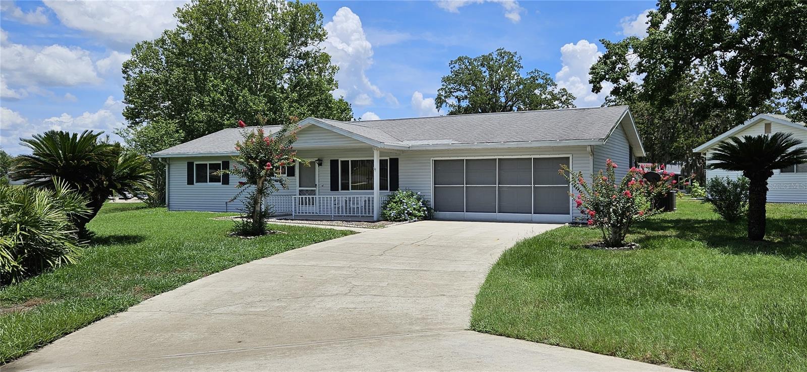 This two-bedroom, two-bathroom home with 1,112 Sq Ft of living space features a spacious living and dining room, air-conditioned Florida room, screened lanai, two-car garage, and indoor laundry room. Situated in the secure, 24-hour gated community of Palm Cay, designed for residents aged 55 and older, with low HOA fees.
The management fee covers trash removal, access to the 24-hour guarded gate, and use of the clubhouse facilities and community pool. Located in Southwest Ocala, just a short distance from shopping, restaurants, the World Equestrian Center, VA hospitals, and other healthcare facilities. Golf carts are permitted, and RV/boat storage may be available for a modest monthly fee. The property is minutes from I-75, one hour from Gainesville, and one and a half hours from Disney.
THE SELLER IS OFFERING A CREDIT/CONCESSION TOWARD ROOF REPLACEMENT! AC 2025
