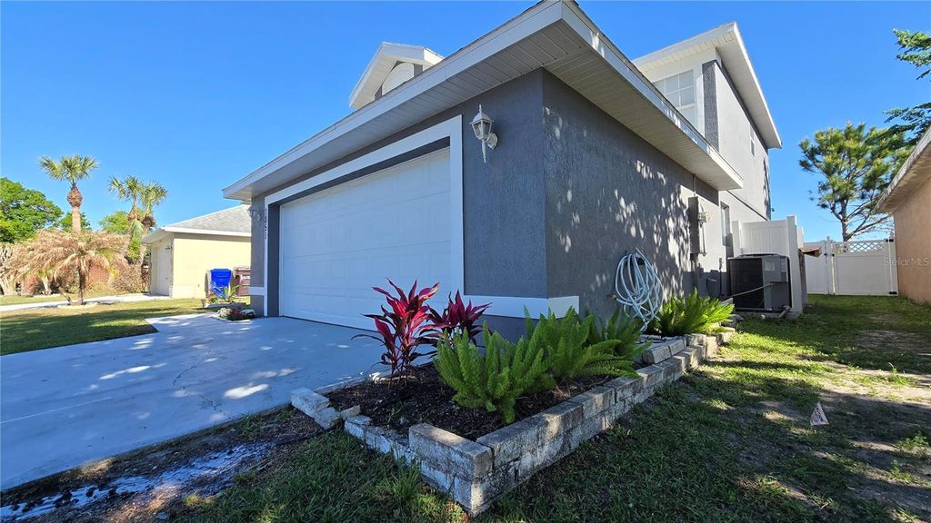 Photo of 1851 Wimbledon Street, Kissimmee, FL 34743 (MLS # O6394417)