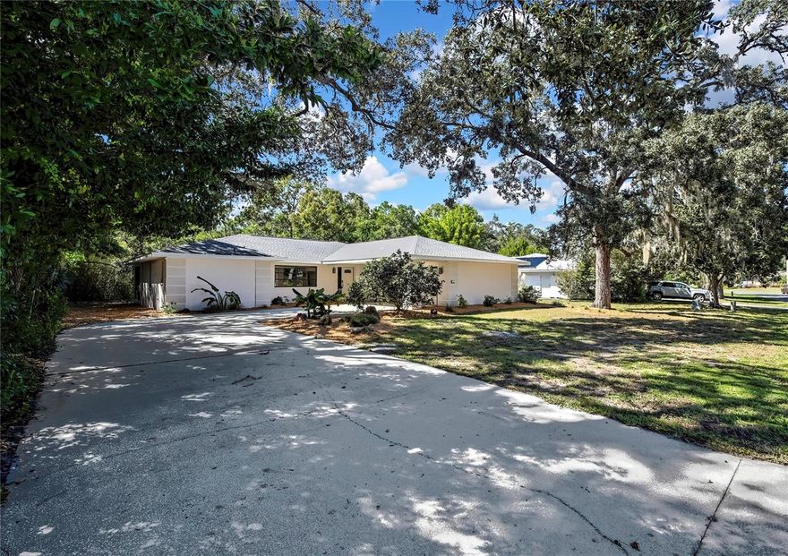 MOVE-IN READY & COMPLETELY UPDATED! NEW ROOF! LOW HOA! This beautifully renovated 3-bedroom, 2-bathroom home with a 2-car garage is located in the highly desirable GOLF community of Sugarmill Woods. Featuring a MODERN open layout and impeccable upgrades throughout, this home shows like new and is ready for its next owner! Step inside and fall in love with the light and bright Eat-in Kitchen, highlighted by a LARGE picture window—perfect for morning coffee with a peaceful view. The kitchen also boasts brand-new stainless steel appliances, stunning granite countertops, and plenty of cabinet space. The entire home has been FRESHLY PAINTED inside and out, and features NEW luxury vinyl plank flooring in the main living areas and NEW plush carpeting in all bedrooms. Both bathrooms have been tastefully remodeled with updated vanities, granite countertops, fixtures, and finishes to reflect today’s style. The owner’s suite offers a private retreat with a large walk-in closet and beautifully updated en-suite bath with double sinks. You’ll also appreciate the large, updated laundry room—a rare find! This space includes a brand-new washer and dryer, storage shelving, and plenty of room to organize and fold, making laundry day a breeze. Enjoy Florida living on the EXAPANSIVE screened lanai—a peaceful outdoor space perfect for relaxing or entertaining with great privacy. The home also includes NEW ROOF, updated landscaping, and excellent curb appeal! Located in the BEAUTIFUL community of Sugarmill Woods OAK Village, you’ll enjoy very low HOA fees—just $155 a year! Conveniently close to shopping, dining, medical facilities, and schools, plus some of Florida’s best natural attractions: Homosassa Springs, Crystal River (swim with manatees!), Buccaneer Bay Water Park, Weeki Wachee River kayaking, Pine Island sunsets, fishing, boating, and the Gulf are all just minutes away.