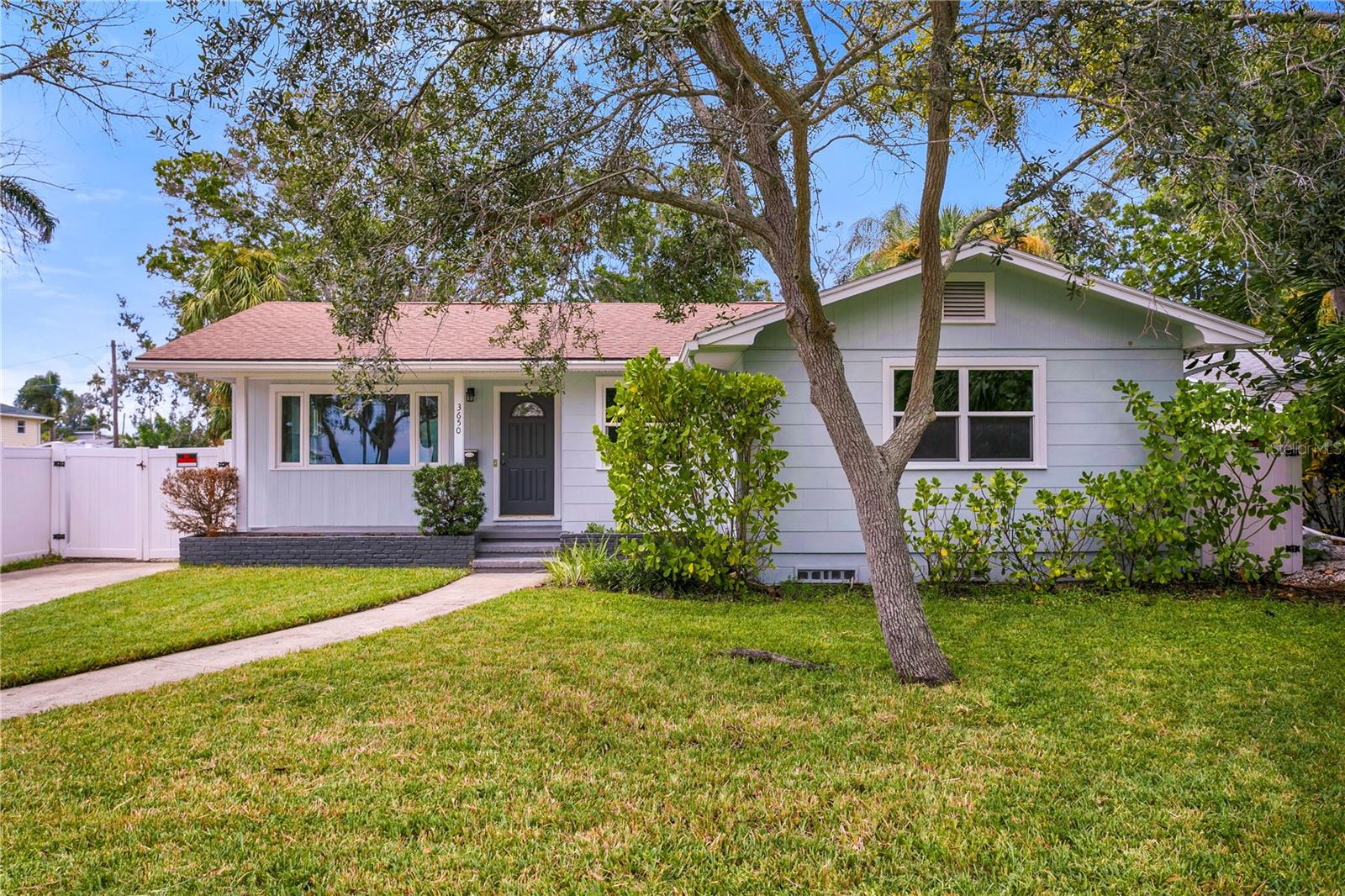 Located on the "Magnificent Mile" one of St. Pete’s premier streets, Bayshore Boulevard, directly across from multimillion-dollar waterfront estates and just 3 miles from vibrant Downtown St. Petersburg this 3-bedroom, 2-bath main house and 1-bedroom, 1-bath ADU offers nearly 2,000 sq. ft. of living space (including the detached ADU) and is being offered at lot value pricing but could be an incredible value with renovations. Featuring great bones with lots of windows, light, a generous lot, and endless potential, this property presents an opportunity to renovate or build new in one of the city’s great waterfront neighborhoods.
