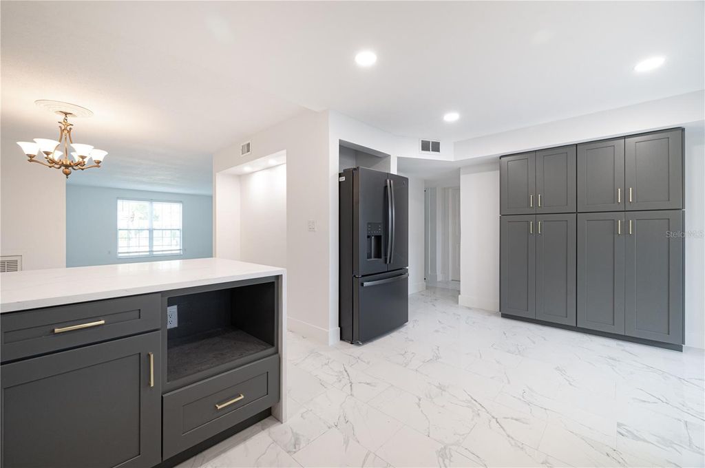 Photo of 1001 Eden Isle Boulevard NE #1, St Petersburg, FL 33703 (MLS # TB8444493)