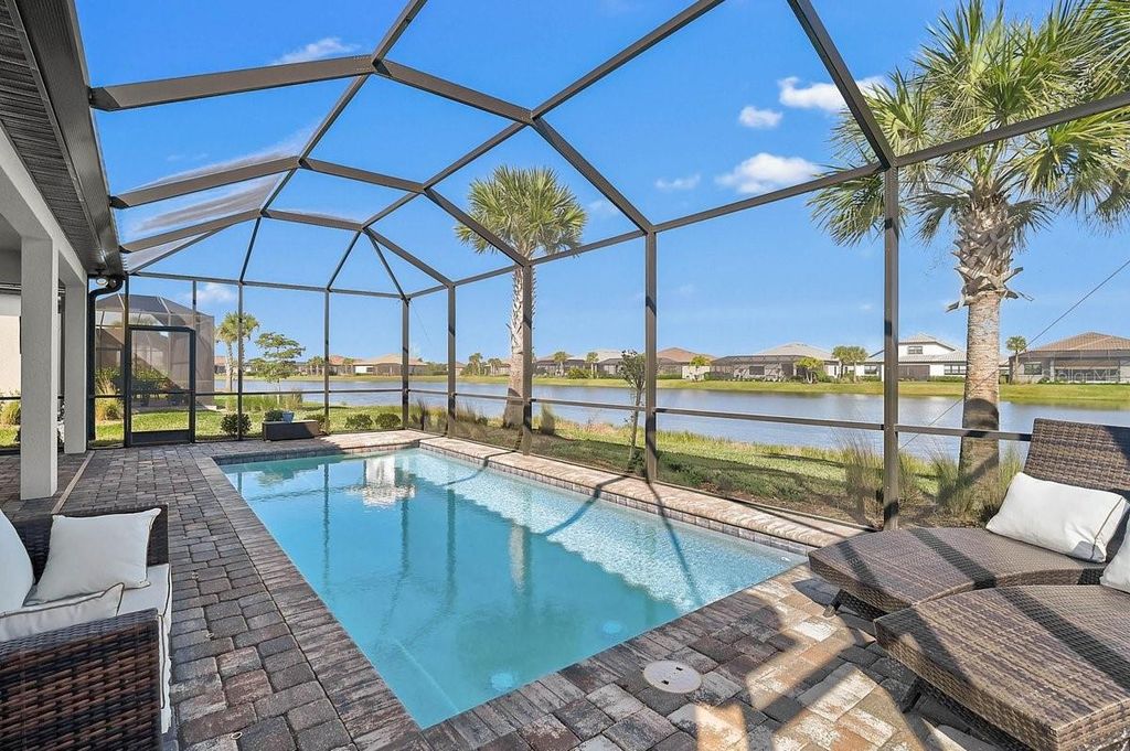 Photo of 7710 Summerland Cove, Bradenton, FL 34202 (MLS # A4680883)
