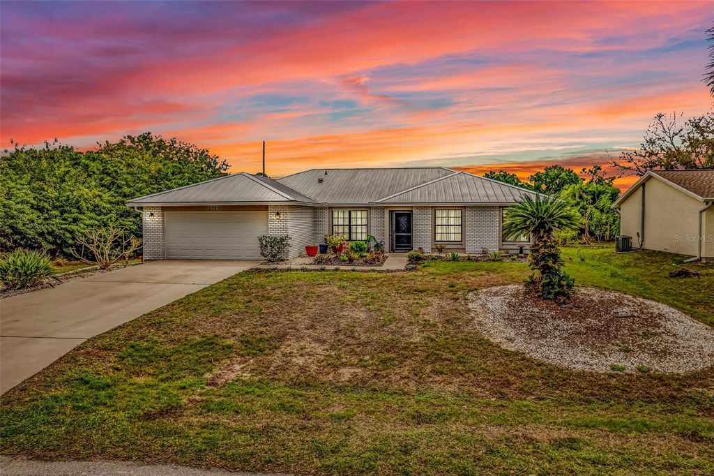 Photo of 23271 Mcquade Avenue, Port Charlotte, FL 33980 (MLS # C7523452)