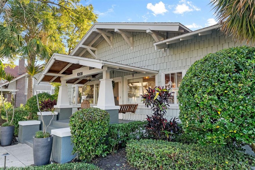 Under contract-accepting backup offers. Welcome to 1001 South Oregon Avenue, a stunningly restored and reimagined historic bungalow nestled on a coveted corner lot in the heart of Tampa’s most prestigious neighborhood—Hyde Park Village. Offering the perfect blend of classic charm and contemporary luxury, this five-bedroom, four-bath residence is a rare architectural jewel with panoramic views of the Bay and effortless access to the neighborhood’s premier dining, boutique shopping, and entertainment. From the moment you arrive, the expansive front porch invites you into a home where craftsmanship, elegance, and thoughtful design meet. Step through the historic wood front door into a light-filled interior curated by renowned designer Thomas Lamb, where smooth plaster walls, a soft neutral palette, and refined finishes offer a fresh, timeless canvas anchored by the home’s original architectural details. Soaring vaulted ceilings, an original wood-burning fireplace, and rich millwork nod to the home’s historic roots, while custom upgrades—including a corner sunroom/office with built-ins and natural wood walls, a generous formal dining space, and a chef’s kitchen—deliver modern-day functionality. The kitchen is a showpiece in itself, featuring a Sub-Zero refrigerator, Viking range, Bosch dishwasher, wine fridge, ice maker, second prep sink, and an antique mirrored backsplash that adds a touch of old-world glamour. Designed for seamless indoor-outdoor living, the backyard retreat features a clean-lined pool and spa, lush artificial turf, a side garden with Italian gas-fired pizza oven, and a screened-in porch with a fully equipped custom wet bar—perfect for entertaining under the stars. The home’s layout offers flexibility and privacy: there are three bedrooms and two baths on the main level, two of the bedrooms share a bath and the other has its own ensuite bath. Upstairs, the primary retreat serves as a serene sanctuary with tons of natural lights and views of the bay and dual walk-in closets, a linen closet, a private laundry, and a spa-inspired bath with double vanities, a glass walk-in shower, and a freestanding soaking tub. A newly built two-car garage with abundant storage sits at the rear of the property, topped by a private guest apartment featuring its own living room, bedroom, full bath, and washer/dryer—ideal for visitors, in-laws, or an au pair. This exquisite property spans 3,458 square feet, including 2,978 SF in the main house and 480 SF in the guest apartment, and is located in the highly sought-after Gorrie, Wilson, and Plant High School districts.