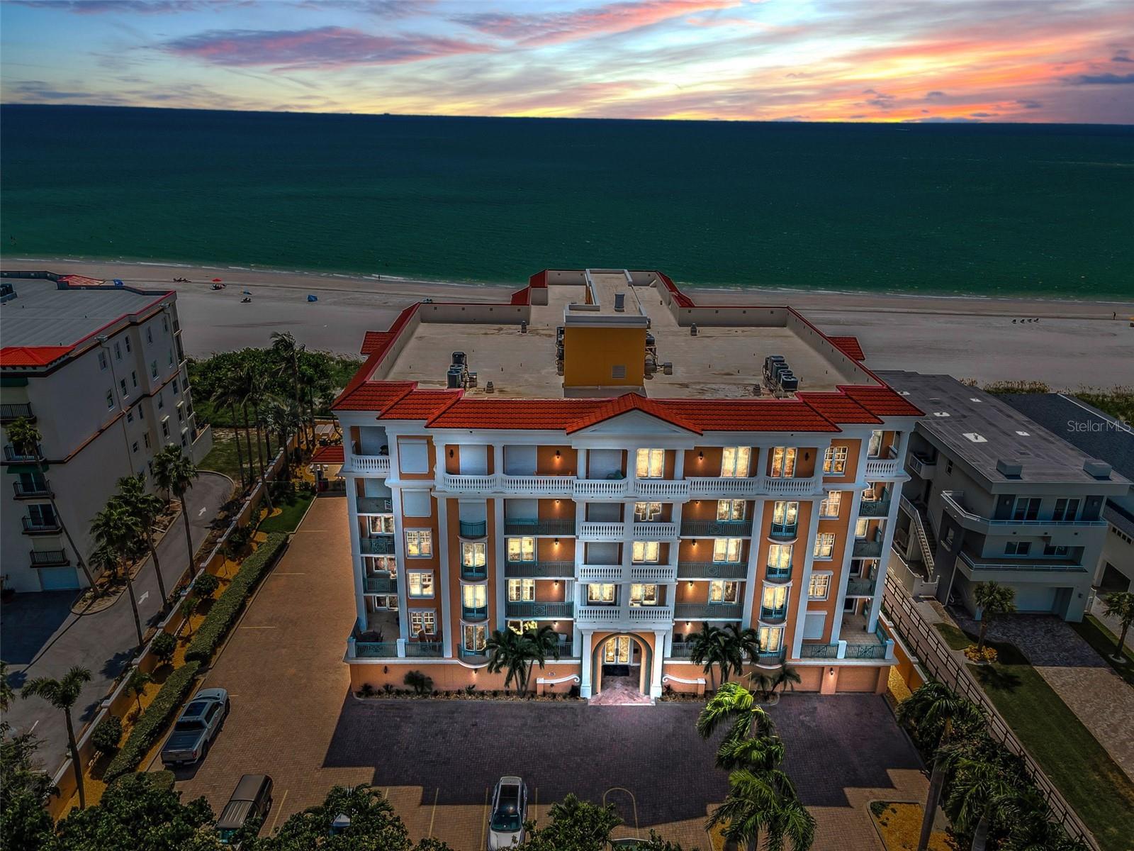 Step into a world of coastal elegance with this extraordinary 3,762 sq ft beachfront masterpiece in the exclusive Vittoria Condominium on Treasure Island’s award winning shores. This rare 3-bedroom, 3.5-bath condo, complete with a stylish office, redefines waterfront living. Private elevator access opens to a grand foyer, welcoming you into a seamless, open-concept layout where a chef’s kitchen dazzles with Monogram stainless-steel appliances, including a double oven, hooded cooktop, dual eat-in bars, and abundant counter space—perfect for hosting unforgettable gatherings. The kitchen flows effortlessly into a dining area with a chic wet bar and a spacious living room, where expansive windows frame breathtaking views of the Gulf’s crystal waters and sugary sands. Each generously sized bedroom suite offers a terrace or balcony, en-suite bathroom, and expansive walk-in closets—two in the luxurious primary suite. This unit boasts four terraces and two balconies, including a sprawling one that overlooks the beach, pool with spa, and Treasure Island’s iconic beaches. Soaring ceilings, abundant natural light, and meticulous craftsmanship create a warm, inviting haven that feels like home from the moment you arrive. Nestled in the gated Vittoria community, steps from John’s Pass Village and downtown Treasure Island, this is a rare opportunity to claim your slice of paradise. Built in 2004, this gated enclave of just 15 luxury residences offers unmatched privacy with secure lobby access, a private two-car garage with Tesla charger, and direct elevator entry to each home. Don’t miss this chance—get a private tour of this exclusive beachfront beauty.