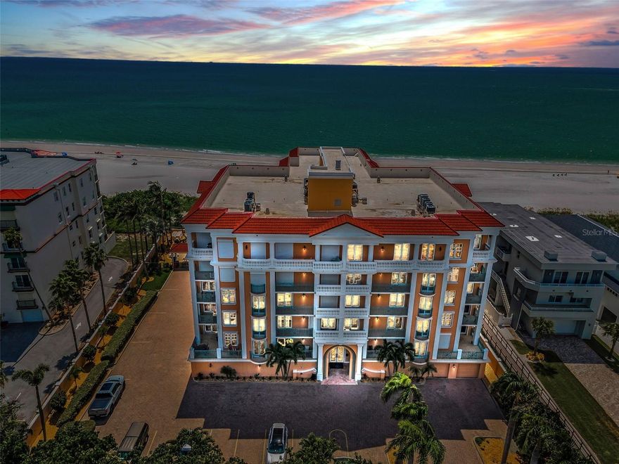 Step into a world of coastal elegance with this extraordinary 3,762 sq ft beachfront masterpiece in the exclusive Vittoria Condominium on Treasure Island’s award winning shores. This rare 3-bedroom, 3.5-bath condo, complete with a stylish office, redefines waterfront living. Private elevator access opens to a grand foyer, welcoming you into a seamless, open-concept layout where a chef’s kitchen dazzles with Monogram stainless-steel appliances, including a double oven, hooded cooktop, dual eat-in bars, and abundant counter space—perfect for hosting unforgettable gatherings. The kitchen flows effortlessly into a dining area with a chic wet bar and a spacious living room, where expansive windows frame breathtaking views of the Gulf’s crystal waters and sugary sands. Each generously sized bedroom suite offers a terrace or balcony, en-suite bathroom, and expansive walk-in closets—two in the luxurious primary suite. This unit boasts four terraces and two balconies, including a sprawling one that overlooks the beach, pool with spa, and Treasure Island’s iconic beaches. Soaring ceilings, abundant natural light, and meticulous craftsmanship create a warm, inviting haven that feels like home from the moment you arrive. Nestled in the gated Vittoria community, steps from John’s Pass Village and downtown Treasure Island, this is a rare opportunity to claim your slice of paradise. Built in 2004, this gated enclave of just 15 luxury residences offers unmatched privacy with secure lobby access, a private two-car garage with Tesla charger, and direct elevator entry to each home. Don’t miss this chance—get a private tour of this exclusive beachfront beauty.