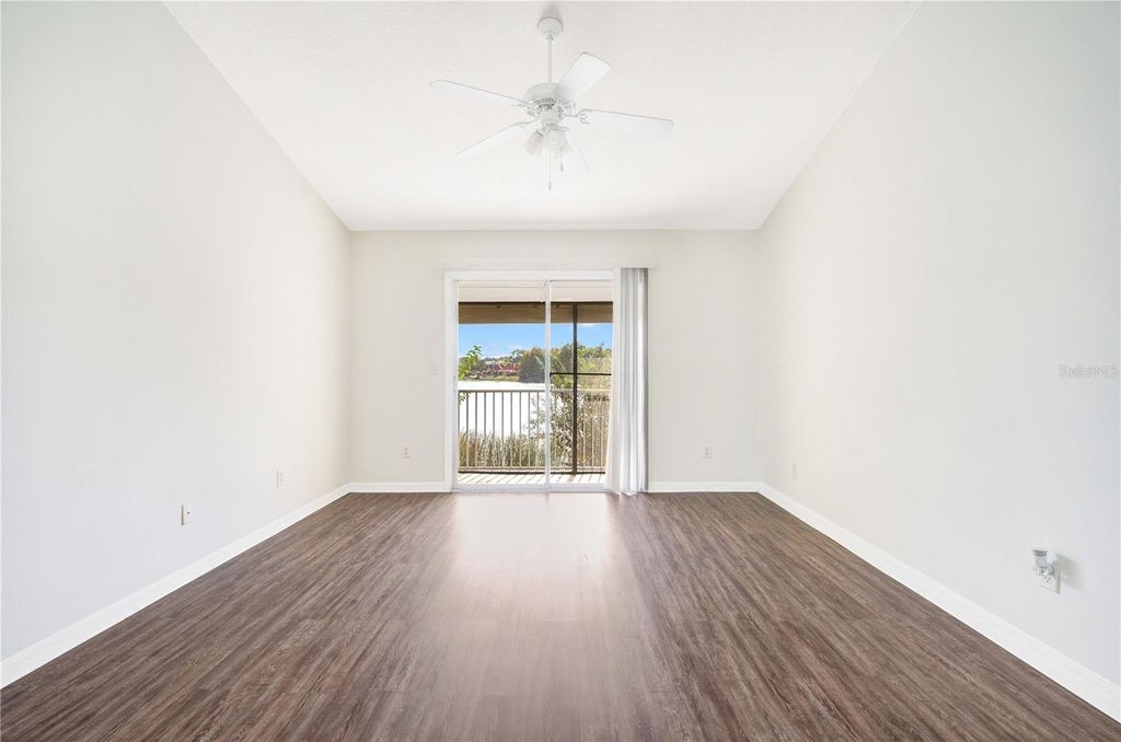 Photo of 145 N Pearl Lake Causeway #202, Altamonte Springs, FL 32714 (MLS # O6392971)