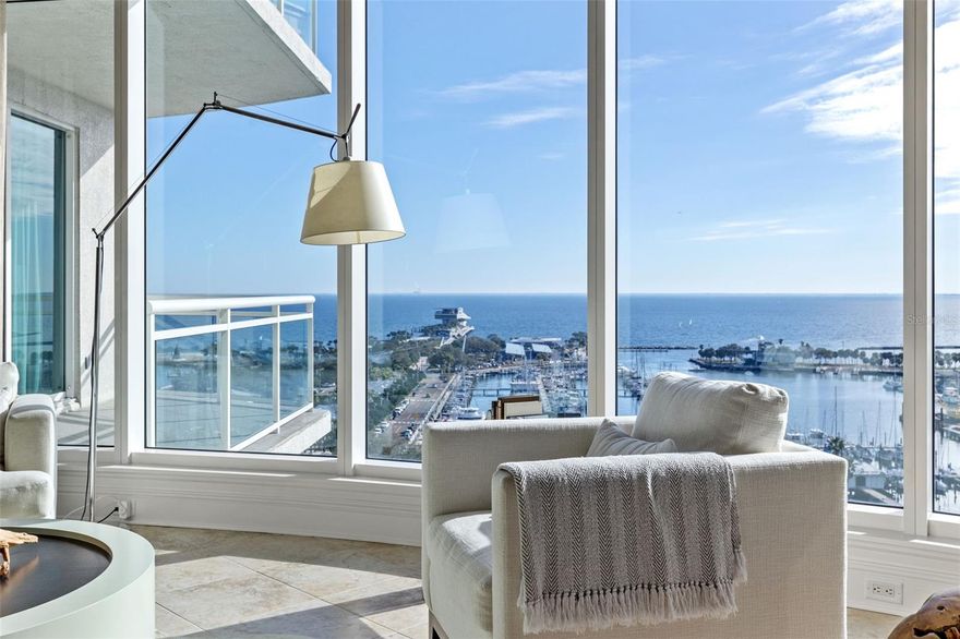 Welcome to the epitome of luxury living downtown. Prepare to be captivated by the breathtaking pier and water views that will leave you in awe. Discover the pinnacle of opulence at Ovation. Indulge in the sophisticated urban boutique waterfront tower, featuring 45 generously-sized residences with unmatched amenities located on the 4th floor, just steps away from the vibrant Beach Drive. Immerse yourself in a world of fine dining, trendy shops, world-class art, and endless entertainment options, all within your reach. As you step into your private elevator, you'll be transported to unit 1402, where the doors open to your elegant foyer entry. Be greeted by the magnificence of water views from every angle. The SE exposure allows for a graceful bath of natural sunlight throughout. In the evenings you’ll be mesmerized by the aerial ambient lights of departing and arriving small aircraft in the distance. This impeccably designed 3-bed, 3.5 bath unit is a true masterpiece with over 3600 sq ft of open concept that effortlessly flows. You'll find the extravagant gourmet kitchen, a chef's dream come true appointed with high end appliances. Grandeur awaits in the primary bedroom, a haven of serenity, with custom closets and floor-to-ceiling windows offering endless water views. The en-suite bathroom is a spa-like sanctuary of relaxation, featuring bespoke marble flooring, a glass walk-in shower, and a separate soaking tub. The two guest suites each offer their own luxurious en-suite and private terraces. The custom-built study/den provides a tranquil space for a home office, library, or even your own yoga retreat. This spacious residence boasts four private terraces providing ample outdoor entertaining space, each offering incredible views. This condo is the personification of contemporary luxury living. Included are two assigned parking spaces that are unobstructed by concrete columns and a climate-controlled storage area with ample space. At Ovation you'll enjoy impressive amenities, including a rooftop heated pool, spa, steam, sauna, fitness center, and 24-hour concierge.
If you prefer a more reclusive and private lifestyle with all that downtown living has to offer then there’s no other choice. Make this prestigious address your address.