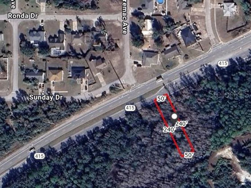 Fantastic opportunity to own a nicely sized 50’ x 240’ lot located directly on State Road 415 in Deltona, just a short drive to New Smyrna Beach and convenient to the Orlando area. This property offers excellent visibility on a paved road in a growing area of Volusia County, surrounded by a mix of residential and rural properties. With easy access to major highways, shopping, and coastal attractions, this lot is ideal for those looking to build or invest in Central Florida’s expanding corridor. Don’t miss your chance to secure this versatile piece of land with endless potential and a great location between the beaches and the city.