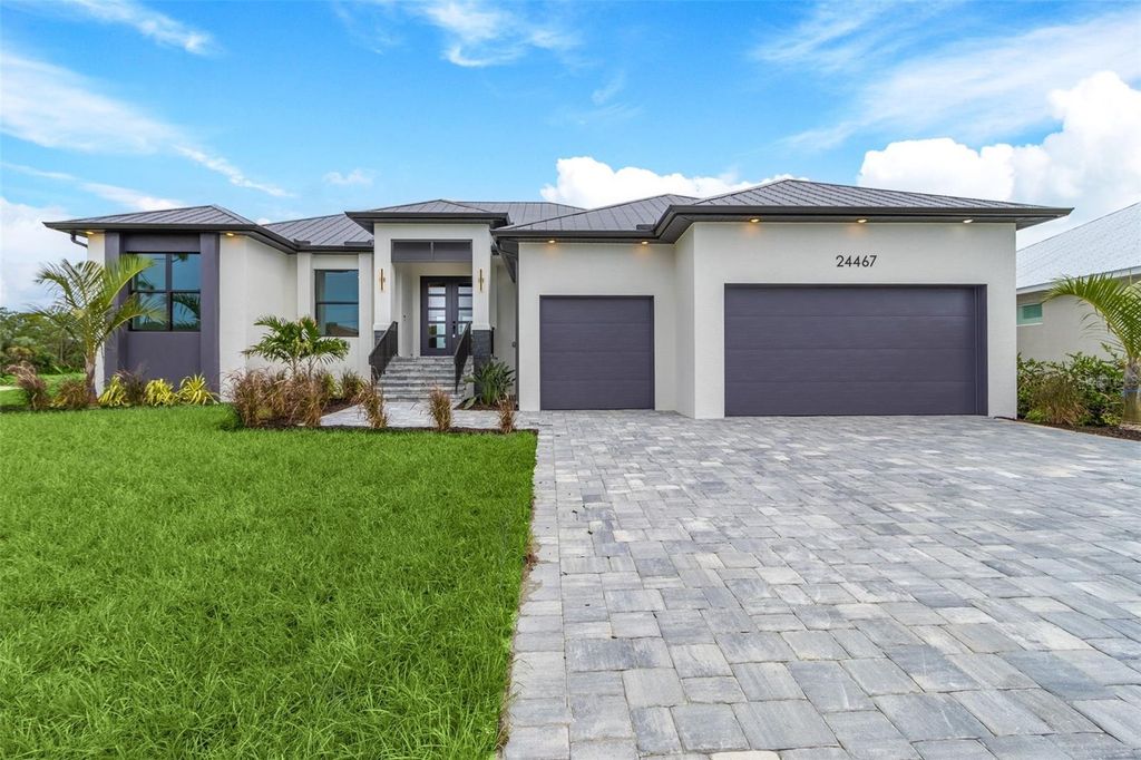 Photo of 24467 Gijon Lane, Punta Gorda, FL 33955 (MLS # C7510123)