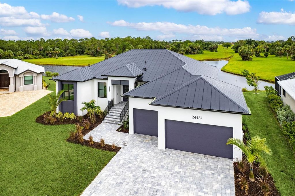 Photo of 24467 Gijon Lane, Punta Gorda, FL 33955 (MLS # C7510123)
