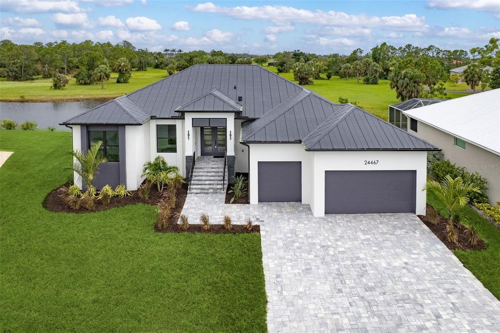 Photo of 24467 Gijon Lane, Punta Gorda, FL 33955 (MLS # C7510123)