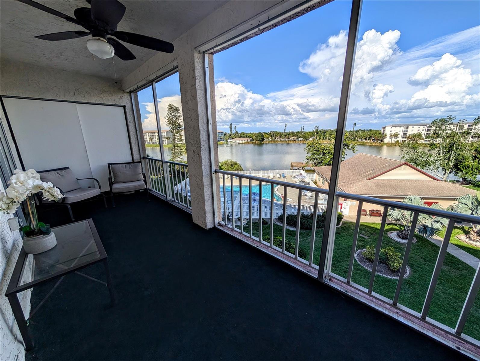 SEASONAL RENTAL** Looking for the perfect winter getaway? Spend your winter here! Relax, unwind, and enjoy the Florida sunshine in a space that’s both comfortable and fully turnkey—just bring your suitcase! Amazing, outstanding LAKE VIEWS from living room, master bedroom & lanai. A favorite place is sure to be out on the screened lanai with its great view of the pool & lake. This charmingly TURNKEY furnished 2BR/1BA beauty is on 4th floor. Beautiful engineered hardwood flooring runs from entry, thru kitchen and into dining area. Updated stainless kitchen appliances too, so whether you're dining in or out, you’ll appreciate the modern touches and easy layout. Located in a friendly 55+ active community, you’ll have access to the heated pool, clubhouse, fishing pier, shuffleboard and lakeside grilling area for cookouts and social gatherings. Laundry rooms are conveniently located on both the 2nd and 4th floors. Centrally located in Bradenton so it's easy to get out to restaurants, shopping centers, theaters, golf courses, SRQ (airport), museums and miles of beautiful Gulf beaches on Anna Maria Island. NO smoking, NO pets. Rental Terms: $1400/mo, 3 month min + 13% resort tax (unless renting for 6+mo: then no tax + better monthly rate!) + $500 damage deposit + $100 cleaning fee + $100 condo application fee. Interested? Don't wait...