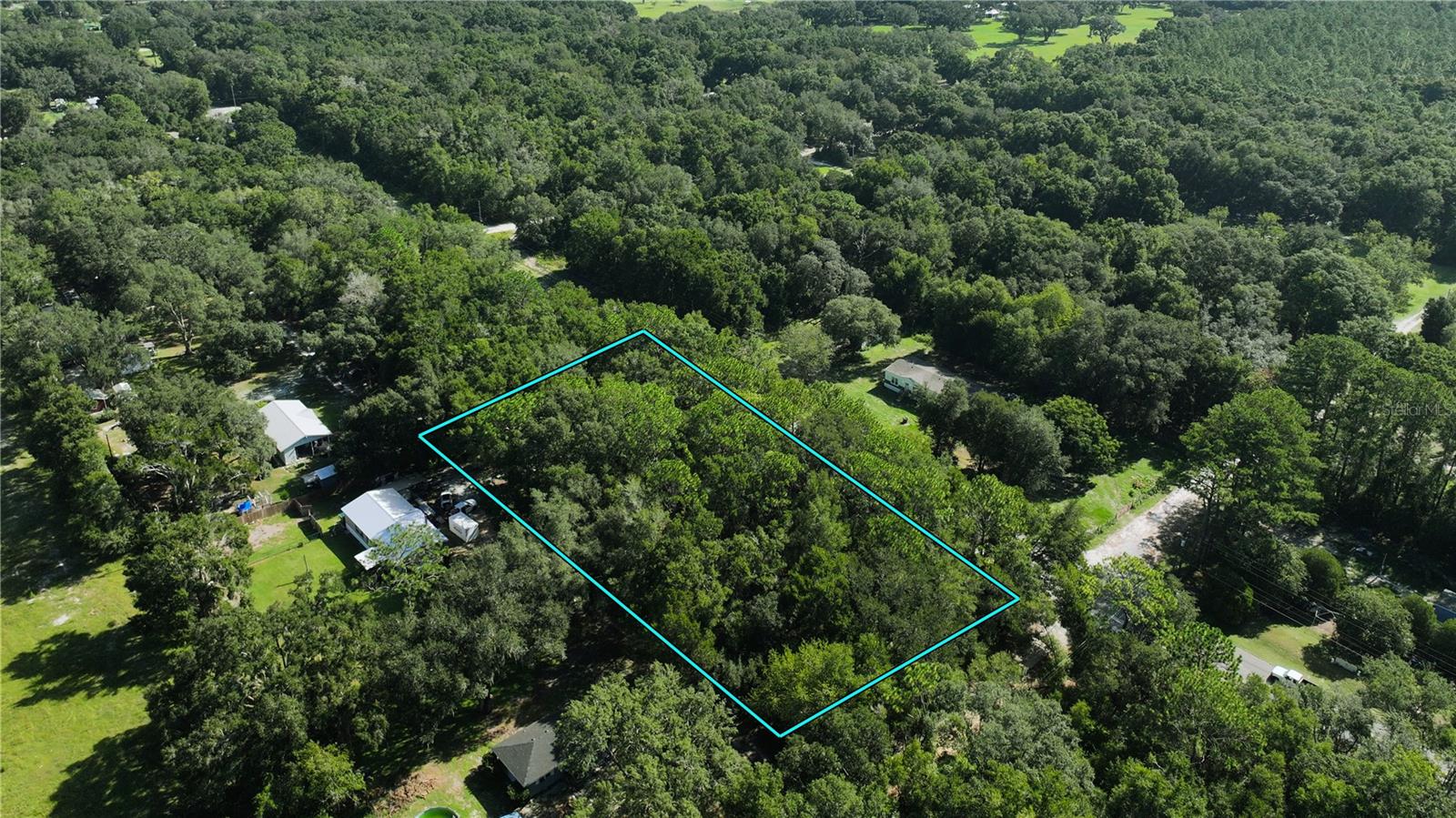Discover the opportunity to own 1.25 acres in the Florida Highlands of Dunnellon, FL. This corner lot offers paved road access and already features a culvert and established driveway, with a recent survey on file—saving you both time and expense. Whether you’re envisioning your dream home or an investment property, this land provides flexible options: site-built, modular, or HUD-approved mobile homes (1976 or newer, 501+ sq ft) are permitted. The zoning also allows for a main home with a guest home on the same lot, offering additional versatility.
Animal enthusiasts will appreciate the freedom to keep up to five large animals—horses, cows, goats, or pigs—and even raise chickens, all without the burden of HOA restrictions. Enjoy the peace and privacy of country living while still being just minutes from Rainbow Springs State Park, the Rainbow and Withlacoochee Rivers, and Dunnellon’s charming historic district, with easy access to Ocala and surrounding areas.
Buyer/Buyer’s Agent responsible for all due diligence. All information is deemed reliable but not guaranteed.
