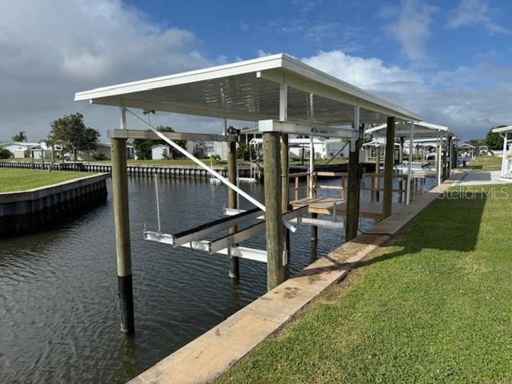 Photo of 142 S Saint Thomas Circle, Apollo Beach, FL 33572 (MLS # TB8434155)