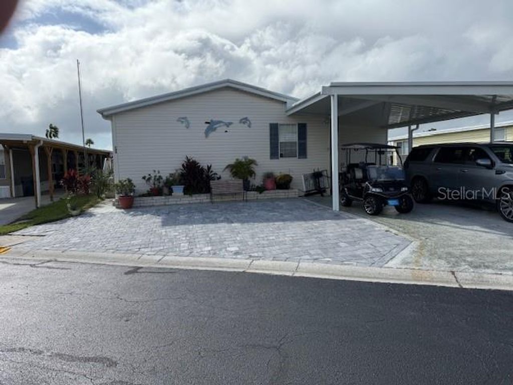 Photo of 142 S Saint Thomas Circle, Apollo Beach, FL 33572 (MLS # TB8434155)