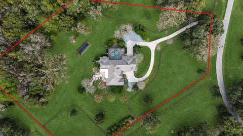 Photo of 2150 SE 73 Loop, Ocala, FL 34480 (MLS # OM717602)