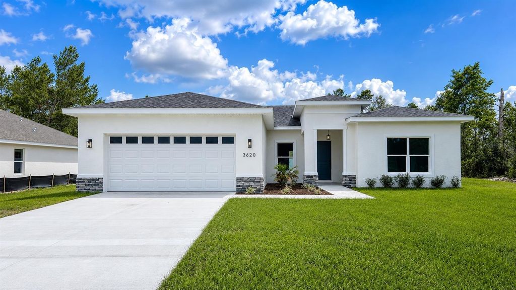 Photo of 3620 SW 127th Lane Road, Ocala, FL 34473 (MLS # O6412243)