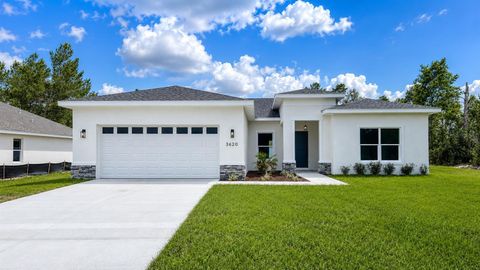 Photo of 3620 SW 127th Lane Road, Ocala, FL 34473 (MLS # O6412243)