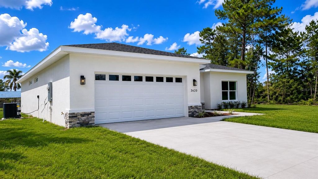Photo of 3620 SW 127th Lane Road, Ocala, FL 34473 (MLS # O6412243)