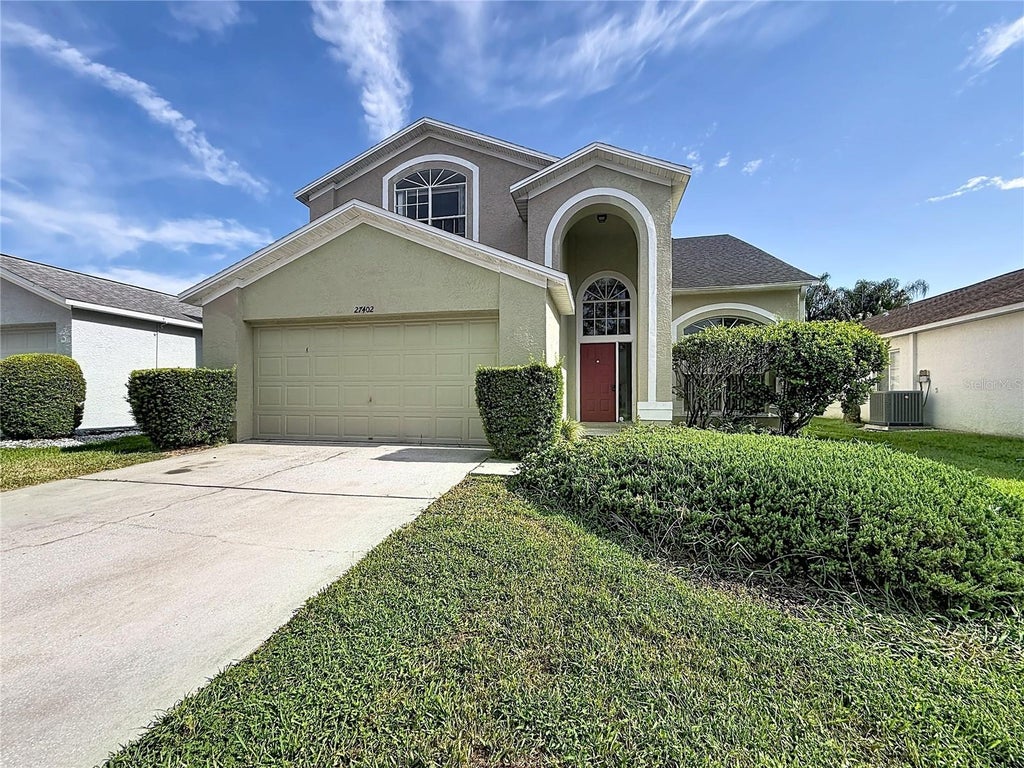 Photo of 27402 Coral Springs Drive, Wesley Chapel, FL 33544 (MLS # TB8539672)