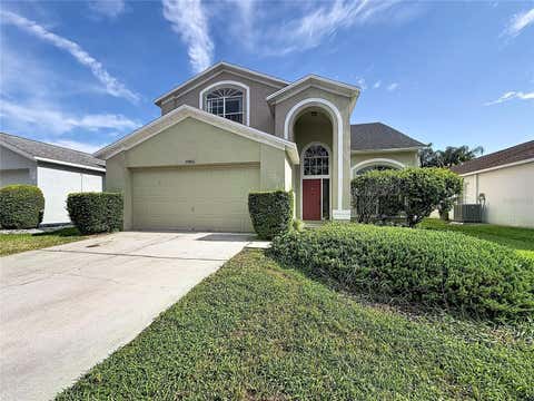 Photo of 27402 Coral Springs Drive, Wesley Chapel, FL 33544 (MLS # TB8539672)