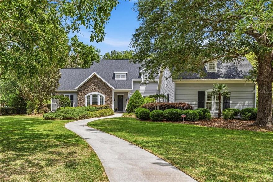 Welcome to this immaculate residence, ideally situated in a private cul-de-sac and surrounded by lush Florida landscaping. This exceptional home is designed for entertaining, featuring a spacious, screened-in covered porch—perfect for birdwatching and enjoying local wildlife—as well as an expansive backyard with ample space for a future pool installation.

Soaring ceilings grace the stunning kitchen and inviting family room, creating an open and airy ambiance. Enjoy a generous dining room and a versatile office space. The luxurious primary suite offers a spa-inspired bath and an expansive closet. Two additional bedrooms are connected by a spacious Jack-and-Jill bathroom. A versatile bonus room is ideal for hobbies or guest accommodations, enhanced by attic access for additional storage. A convenient half bathroom is located on the main level, adjacent to the kitchen.

Experience the perfect blend of comfort and convenience—just a short drive from the University, top-rated schools, popular restaurants, shopping, parks, and more. Discover a home where lifestyle and location meet.