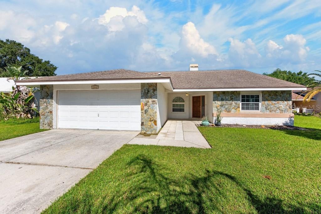 Photo of 12007 Misty Brook Court, Tampa, FL 33635 (MLS # TB8551572)