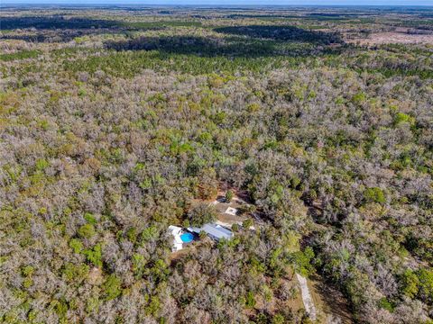 Photo of 5011 SE 193rd Place, Inglis, FL 34449 (MLS # O6390433)