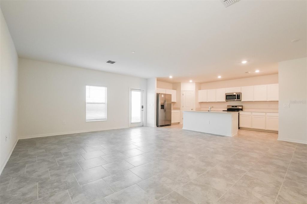 Photo of 1220 Tyler Loop, Winter Haven, FL 33884 (MLS # O6375534)