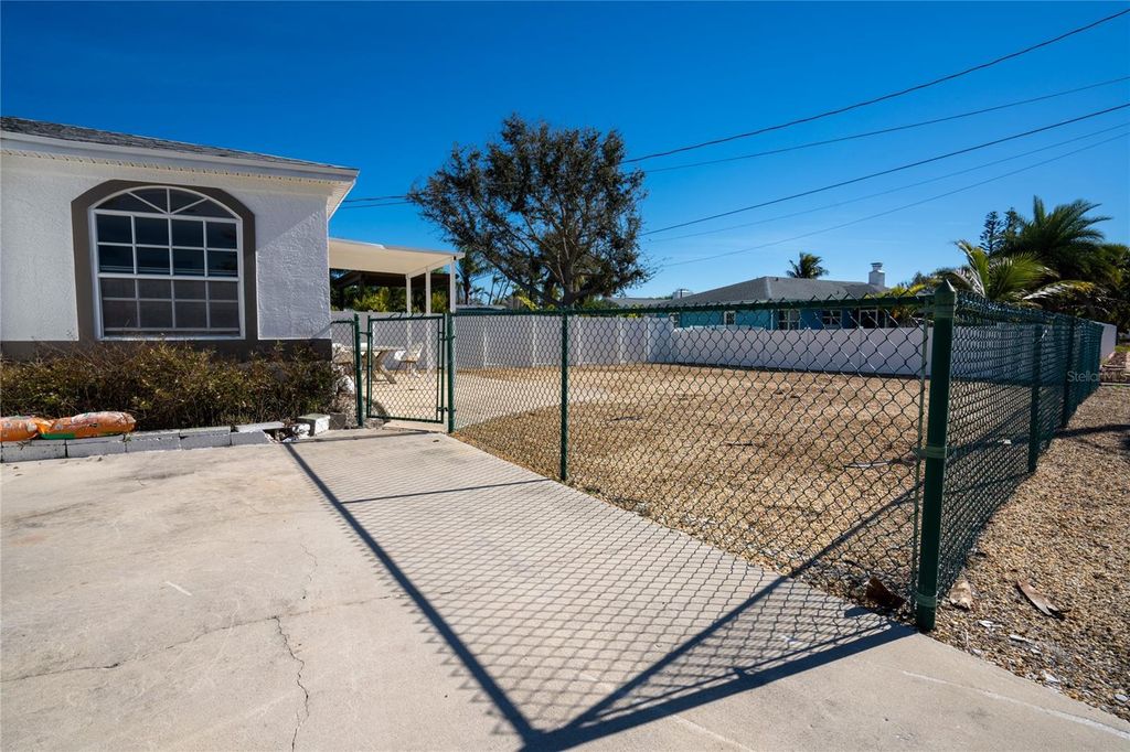 Photo of 7951 Gulf Boulevard, St Pete Beach, FL 33706 (MLS # TB8466793)