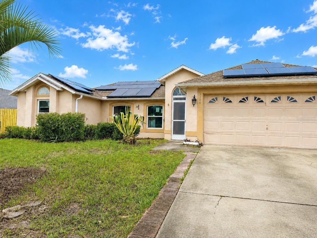 Photo of 3208 Kings Ridge Terrace, Deltona, FL 32725 (MLS # V4950625)