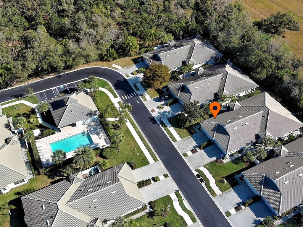 Photo of 209 Reclinata Circle, Venice, FL 34292 (MLS # N6142976)