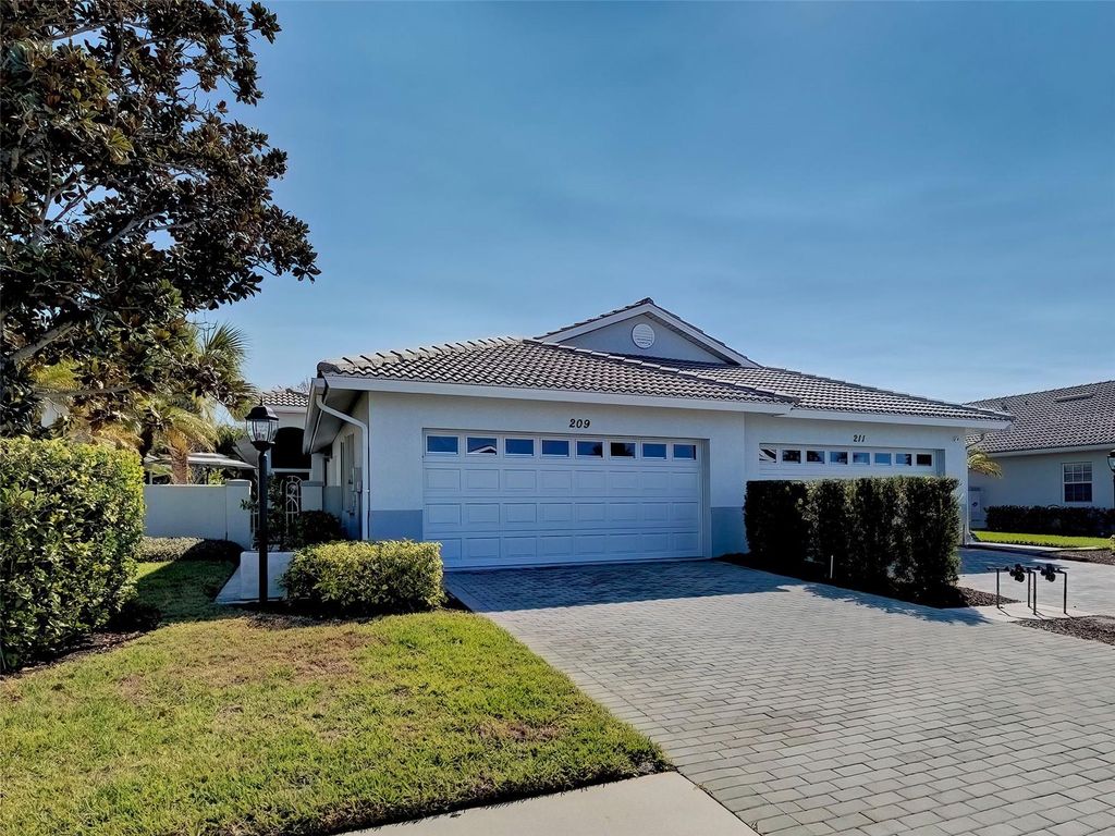 Photo of 209 Reclinata Circle, Venice, FL 34292 (MLS # N6142976)