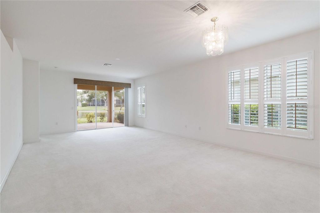 Photo of 4939 Lakescene Place, Sarasota, FL 34243 (MLS # A4666639)