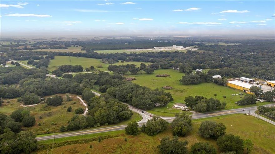 Prime Development Property in one of Central Florida's fasting growing areas. With The Villages coming at warp speed this property is ready for development. App. 59 acres are annexed into the City Limits of Leesburg and is zoned for multiple uses. Commercial, Professional, Multi-family and Residential. Utilities and permitting from the City of Leesburg. The property starts at the corner of Hwy. 33 and Hwy.48, offering 450 +/- ft. on 33;  1,000 +/- ft. on 48 and 1155 ft. +/- on both sides of S. Quarters Road. Excellent location less than 10 minutes to the Fl. Turnpike Interchange and app. 10 minutes from Hwy. 27. With the permitting of mega project The Villages at West Lake, this property is in the corridor for fast and furious Development. The property is mostly cleared and all is high and dry. The current owners have Ag. exemption on the property to help with RE Taxes until ready to use. The property is producing some income and has potential for more.