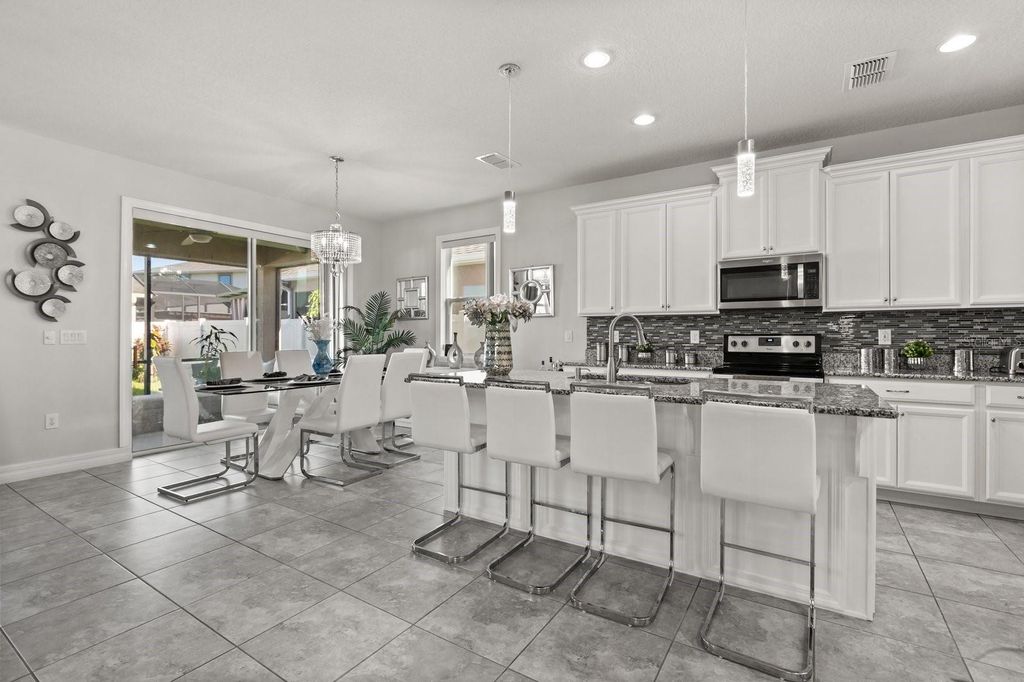Photo of 2417 Chateau Loop, Kissimmee, FL 34741 (MLS # O6350425)