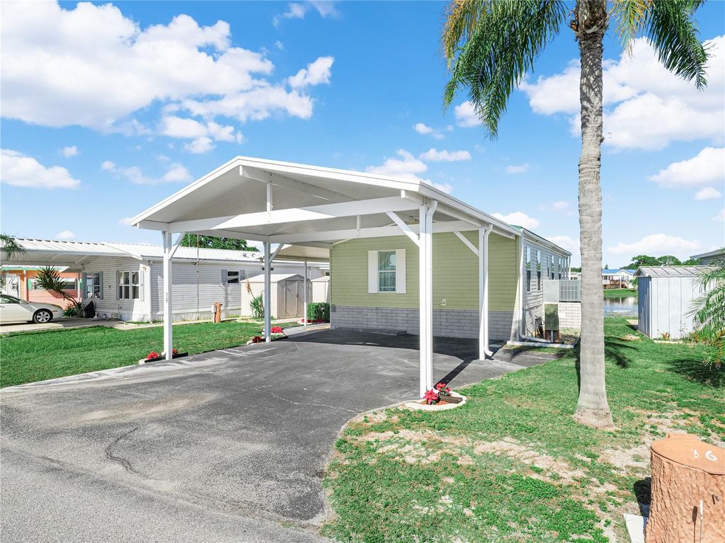 Photo of 16 Queen Of Waters Street, Lake Wales, FL 33898 (MLS # K4903141)