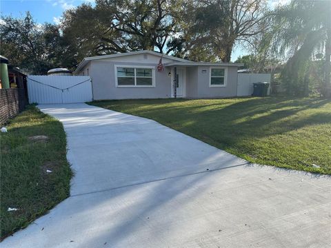 Photo of 4305 E Henry Avenue, Tampa, FL 33610 (MLS # TB8481692)