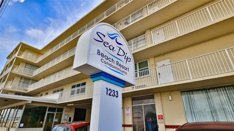 Photo of 1233 S Atlantic Avenue #1020, Daytona Beach, FL 32118 (MLS # O6320108)